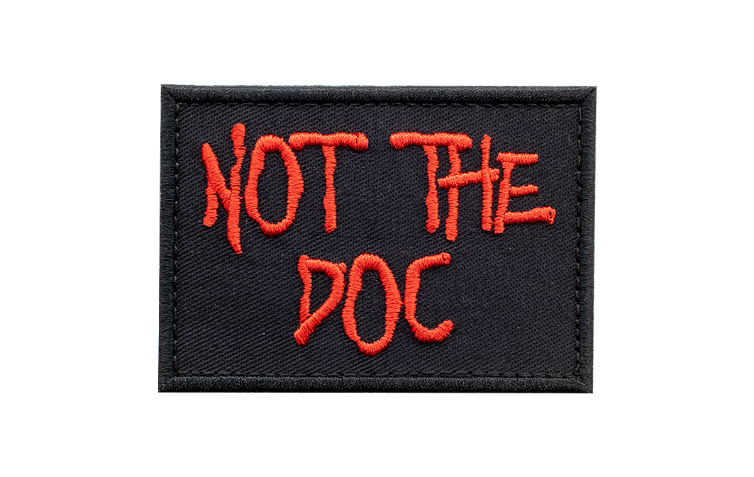 Patch "NOT THE DOC", 50x70 mm, schwarz